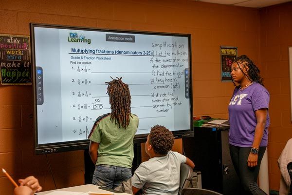 youth learning math in after school program